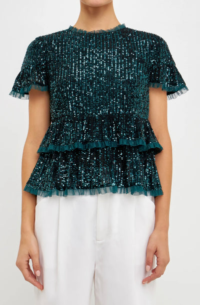 Sequin peplum top in green